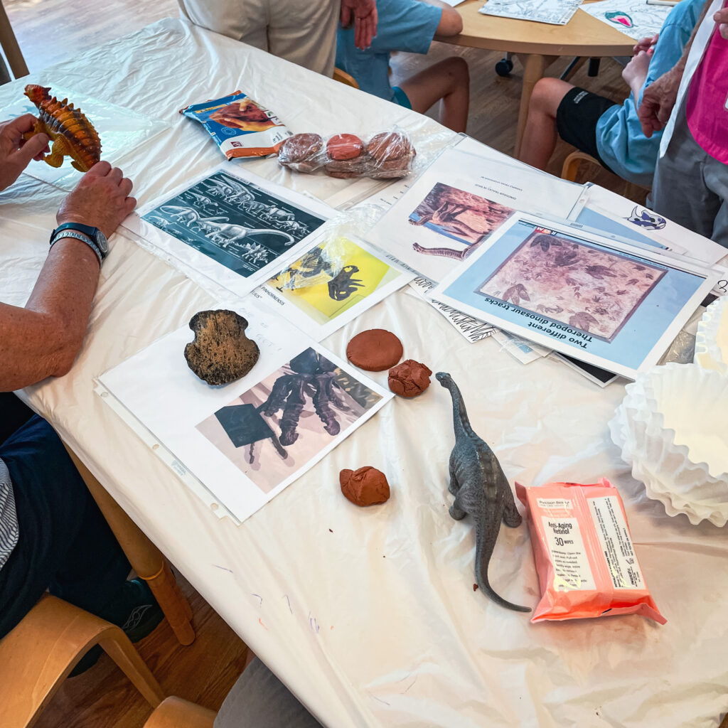 dinosaur items on table