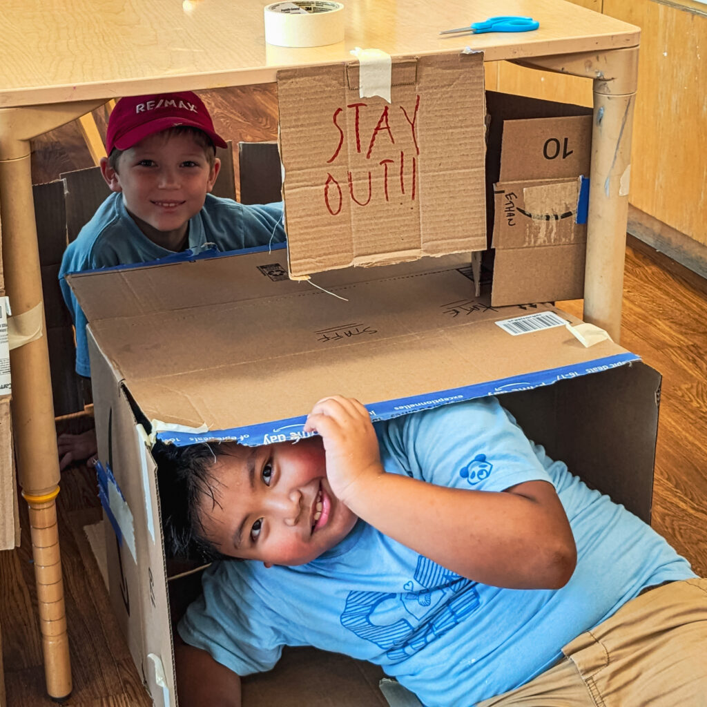 children under table fort